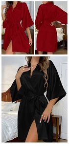 Detailed view of satin robes in burgundy and black with classic V-neck and belted waist