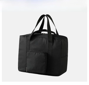 Front view of black Oxford fabric travel bag with zipper pocket and sturdy webbing handles