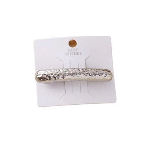 Silver round zinc alloy spring hair clip hairpins on a white display card backing