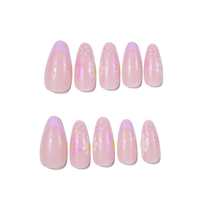 Detail of almond-shaped nails featuring purple French tips and daisy flower designs