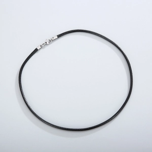 Detailed view of black braided leather cord necklace with silver lobster clasp closure
