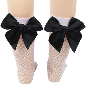 White mesh fishnet socks for girls with large black bow accents in a classic British style