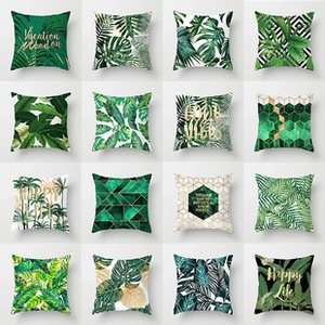 Detailed grid view of sixteen tropical green leaf and geometric pattern cushion covers