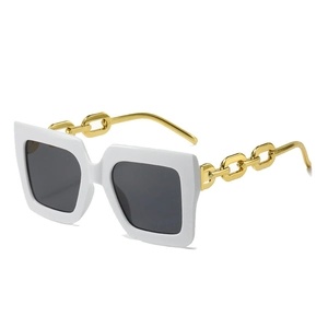 Oversized white frame sunglasses with gold chain temples and black lenses, 45-degree angle
