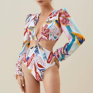 Maillot de bain une pièce à manches longues et col en V avec imprimé tropical vibrant