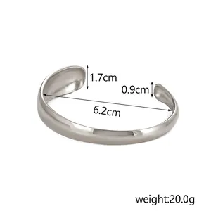 Size specifications of vintage stainless steel bangle showing 6.2cm inner diameter and width