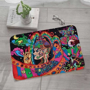 Artistic psychedelic flannel bath mat with colorful illustration on light wood floor