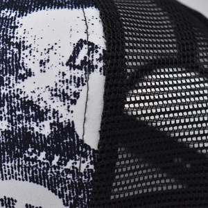 Fashionable mesh baseball cap featuring gradient print canvas and breathable black netting