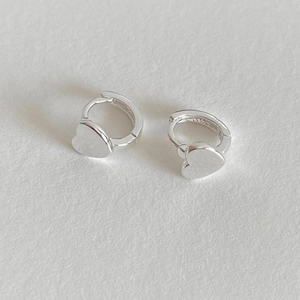 Minimalist 925 sterling silver heart-shaped huggie earrings with polished silver finish