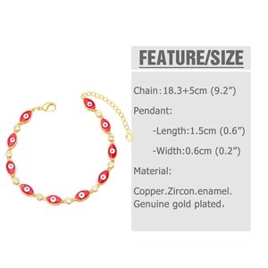 Detail of gold evil eye bracelet with red enamel charms and sparkling cubic zirconia