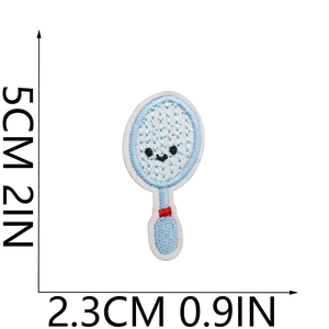 Mini tennis racket embroidered patch detail showing blue cartoon design and dimensions