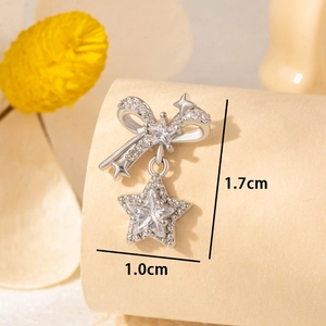 Elegant silver star and bow stud earrings with sparkling cubic zirconia crystals