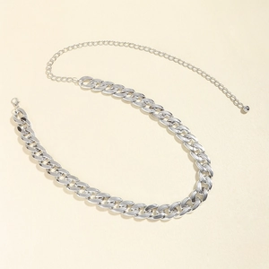 Detailed view of silver Cuban link waist chain with lobster clasp and adjustable extender