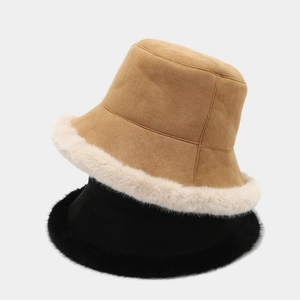Winter plush bucket hats in camel and black with thick faux fur trim for cold weather