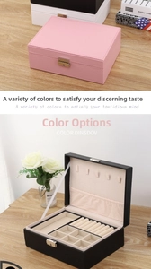 Dual-layer PU leather jewelry box detail showing interior necklace hooks and ring slots