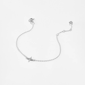 Detail of S925 sterling silver four-point star bracelet with adjustable lobster clasp