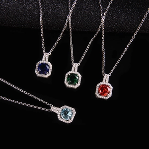Elegant silver pendant necklaces with square zircons in royal blue, emerald, and ruby