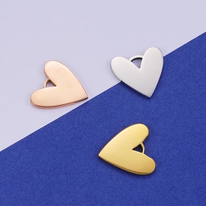 Polished stainless steel heart pendants in gold, silver, and rose gold finishes