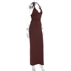 Detail of deep coffee halter dress showing gold metal ring and waist pleats