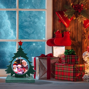 Christmas tree shaped wooden photo frame with red star topper and round photo insert