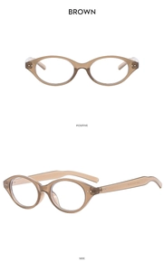 Detail view of brown amber round glasses frames with rivet accents and transparent finish