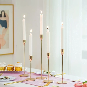 5-piece gold iron candlestick set in various heights for elegant dining table decor