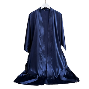 Elegant deep blue satin long-sleeved robe featuring a silky finish and matching waist tie