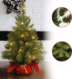 60cm mini desktop Christmas tree with red burlap base and warm LED lights detail