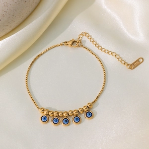 Bracciale in acciaio inossidabile placcato oro 18K con cinque ciondoli occhio blu su raso