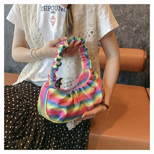 Detail of colorful rainbow pleated shoulder bag with a stylish dumpling shape design