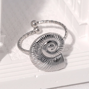 Adjustable silver nautilus shell ring in stainless steel with hammered texture finish