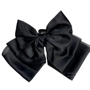 Large black satin bow hair claw clip for women's high ponytail hairstyles