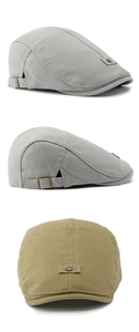 Detail view of cotton linen beret cap with metal side buckles in grey and khaki