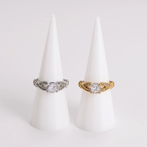 Elegant stainless steel cubic zirconia rings in gold and silver with twisted bands