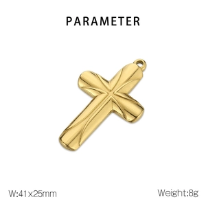 Detail of gold cross pendant with radial groove texture showing 41mm x 25mm dimensions