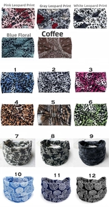 Collection of wide elastic headbands in paisley, leopard, and floral patterns with knots