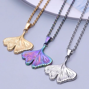 Detailed comparison of ginkgo leaf pendants in gold, silver, and rainbow steel finishes