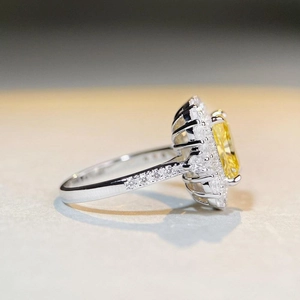 Elegant S925 sterling silver ring with Radiant cut yellow diamond and halo setting
