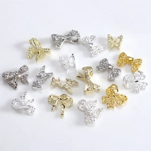 3D gold and silver metal bowknot nail art charms with sparkling rhinestones set of 16