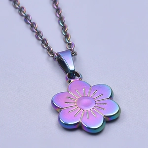 Macro detail of a 18k rainbow plated stainless steel five-petal flower pendant necklace