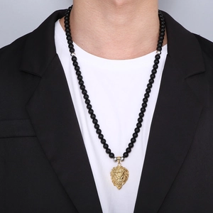 Men's gold lion head pendant necklace with 8mm black onyx beads and silver accents