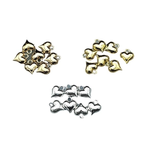 DIY jewelry heart-shaped pendants in polished gold and silver metal finishes