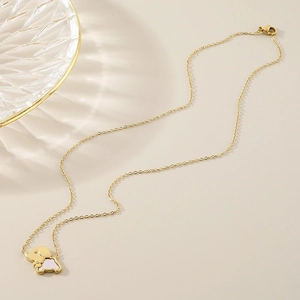 Golden stainless steel necklace with a diamond-studded animal pendant and mother of pearl