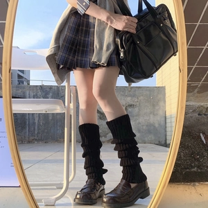 Japanese JK style black knitted leg warmers for Lolita fashion in outdoor street setting