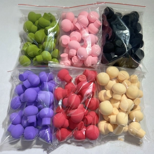 Macro view of mushroom makeup sponge set in six colors packed in clear pouches