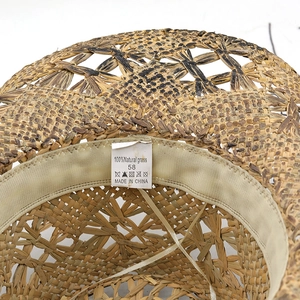 Handmade natural grass cowboy hat with interior view showing size 58 label and sweatband