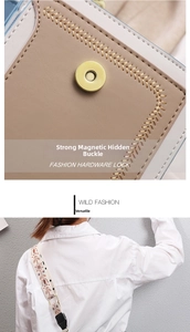 Detail of strong magnetic buckle and ethnic embroidery strap on crossbody bag