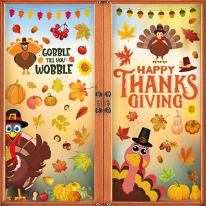 Detail of Thanksgiving window decals with turkey and pumpkin motifs on glass doors