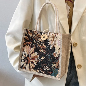Linen tote bag with vintage floral jacquard pattern and rustic wooden button closure