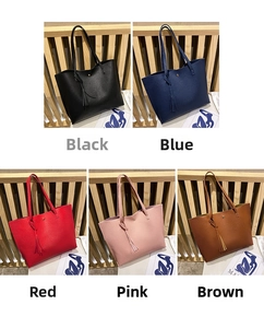 Minimalist faux leather tote bags with tassels shown in black, blue, red, pink, and brown